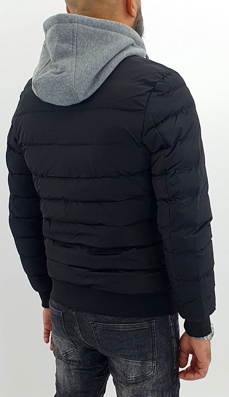 piumino uomo semi impermeabile nero con pettorina e cappuccio felpato fisso
