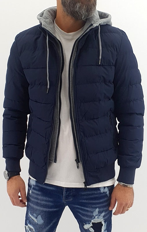 piumino uomo semi impermeabile blu con pettorina e cappuccio felpato fisso