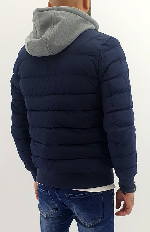 piumino uomo semi impermeabile blu con pettorina e cappuccio felpato fisso
